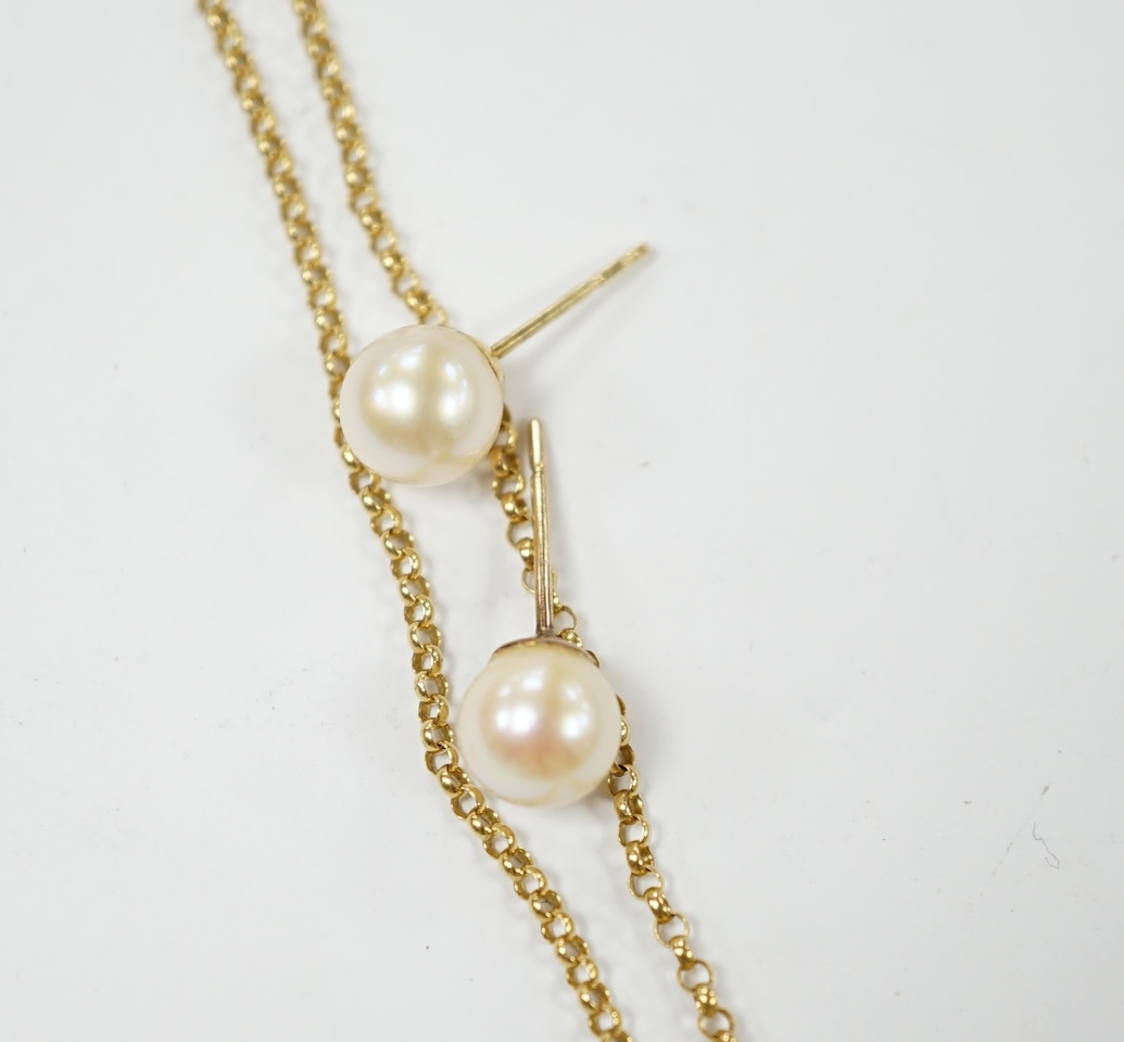 An 18ct gold fine link chain, 43cm, 3 grams and a pair of 18k and cultured pearl set ear studs. Condition - fair